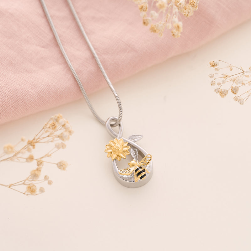 Bee and Sunflower Cremation Ashes Necklace in Stainless Steel. Nature inspired memorial jewellery.