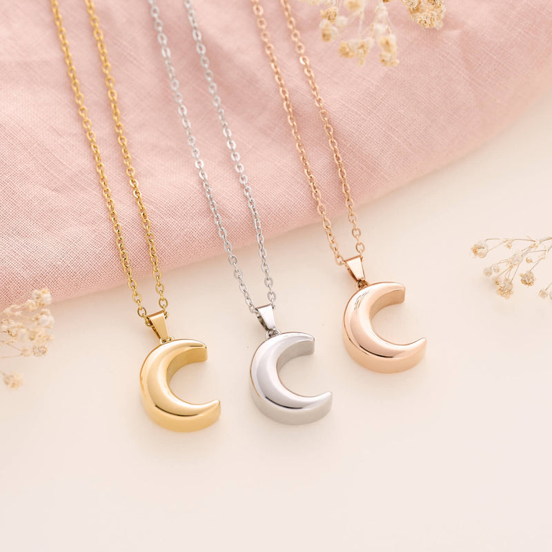 beautifully laid out creamtion jewellery crescent moon locket