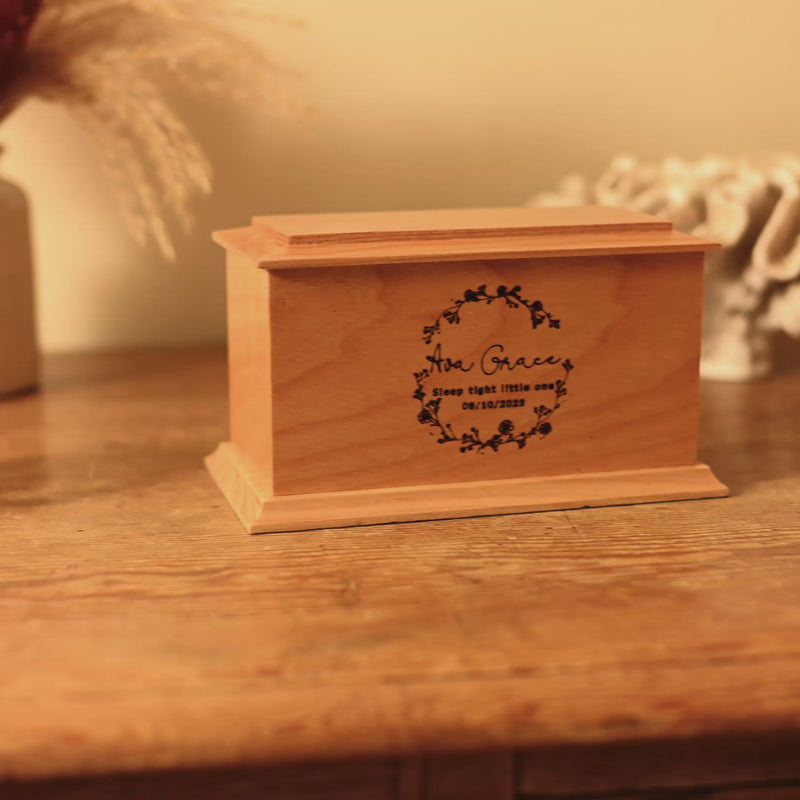 A video showing the detail on a cremation urn for a stillborn baby. 