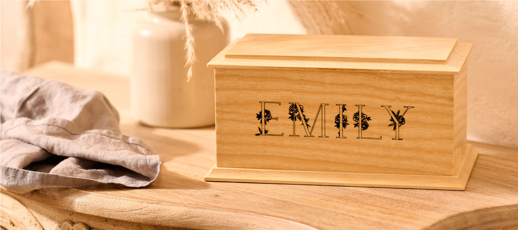 Handcrafted wooden cremation urn by Thicket Memorials, designed to honour loved ones"