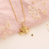 Dove Shaped Urn Pendant in gold