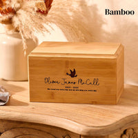 Personalised cremation urn for a child, made of bamboo, sits on a table. 